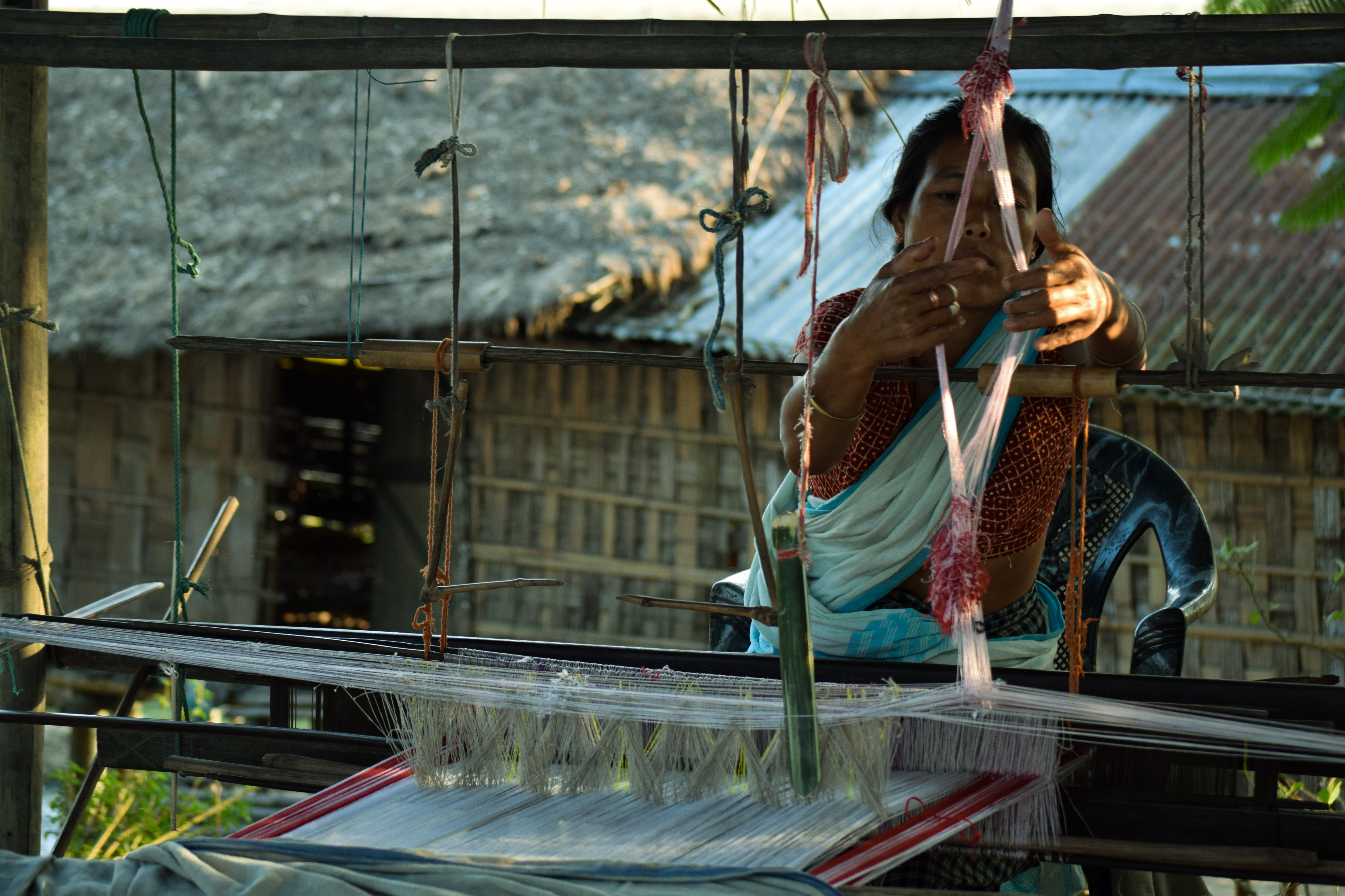 Woman weaving Assamese tapestry@Majuli