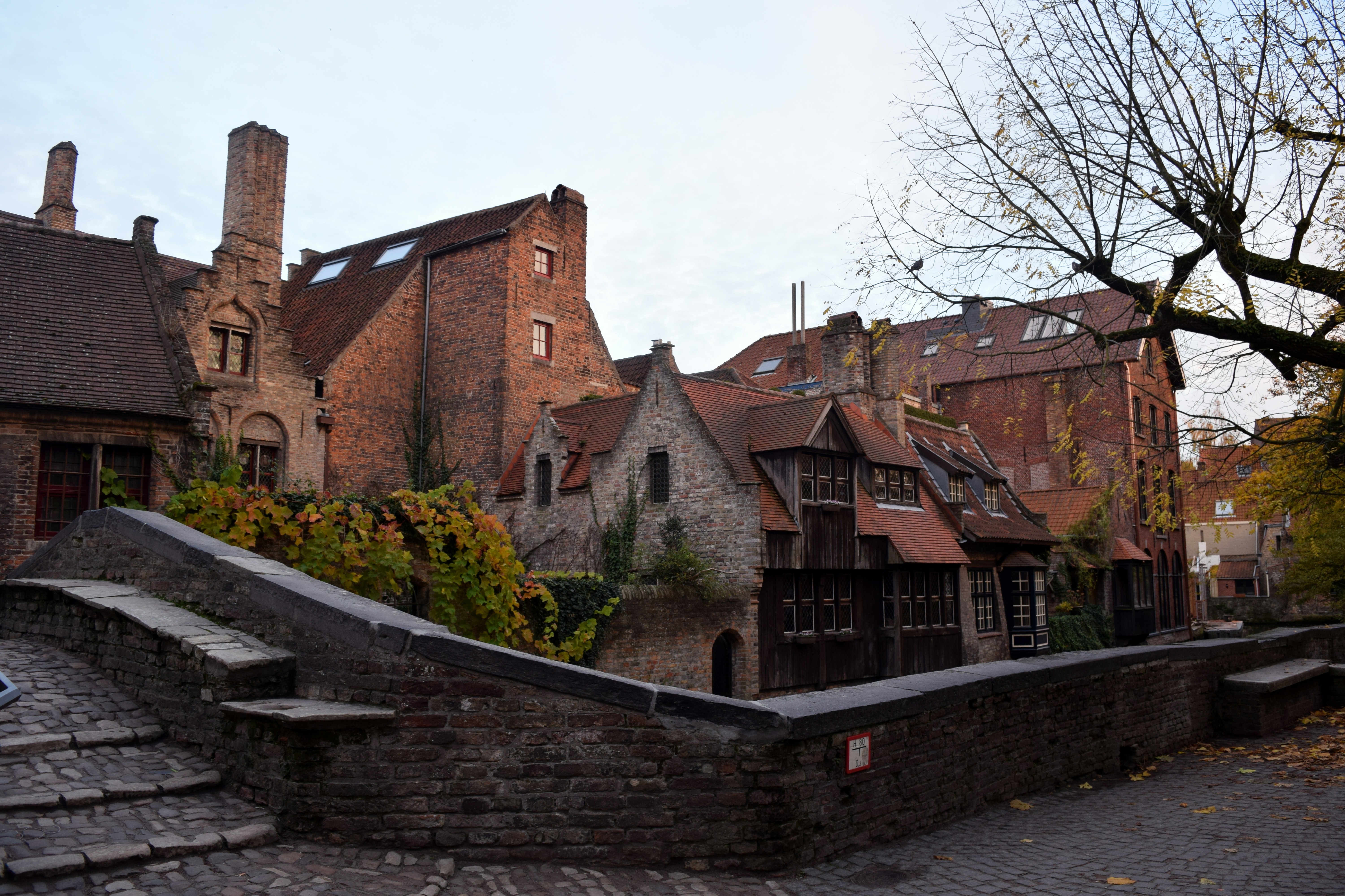 At the back of St. John's hospital, Bonifacious bridge, and the Church of our lady